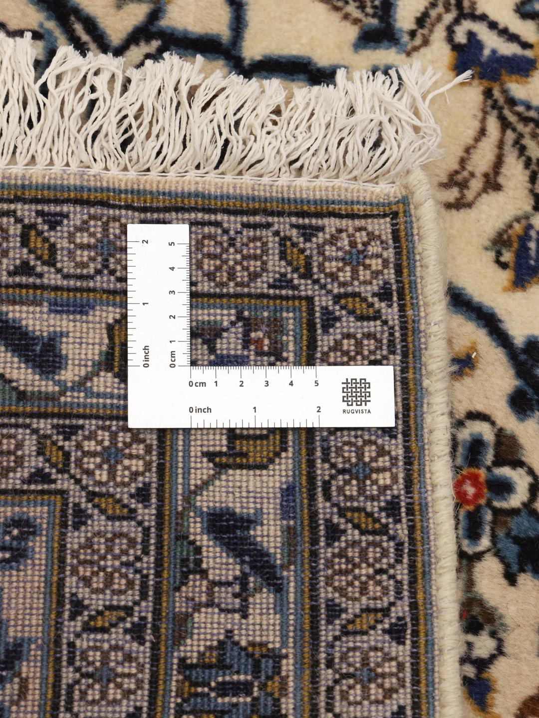 Hand-knotted Keshan rug with floral patterns in beige and blue tones