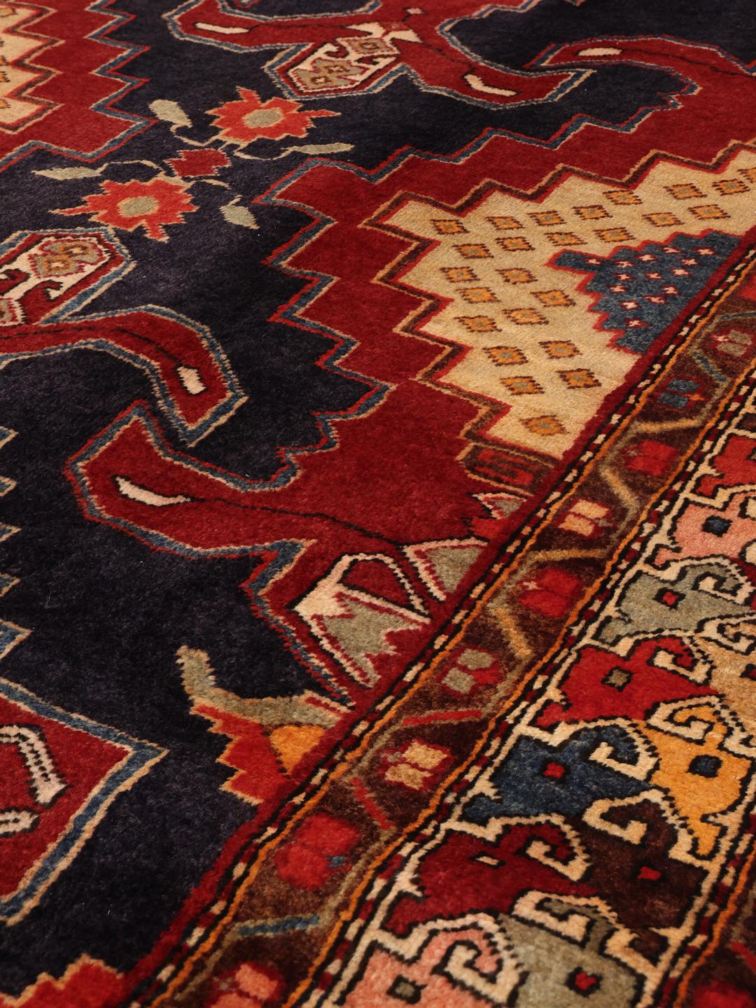 Hand-knotted red and blue Middle Eastern runner rug
