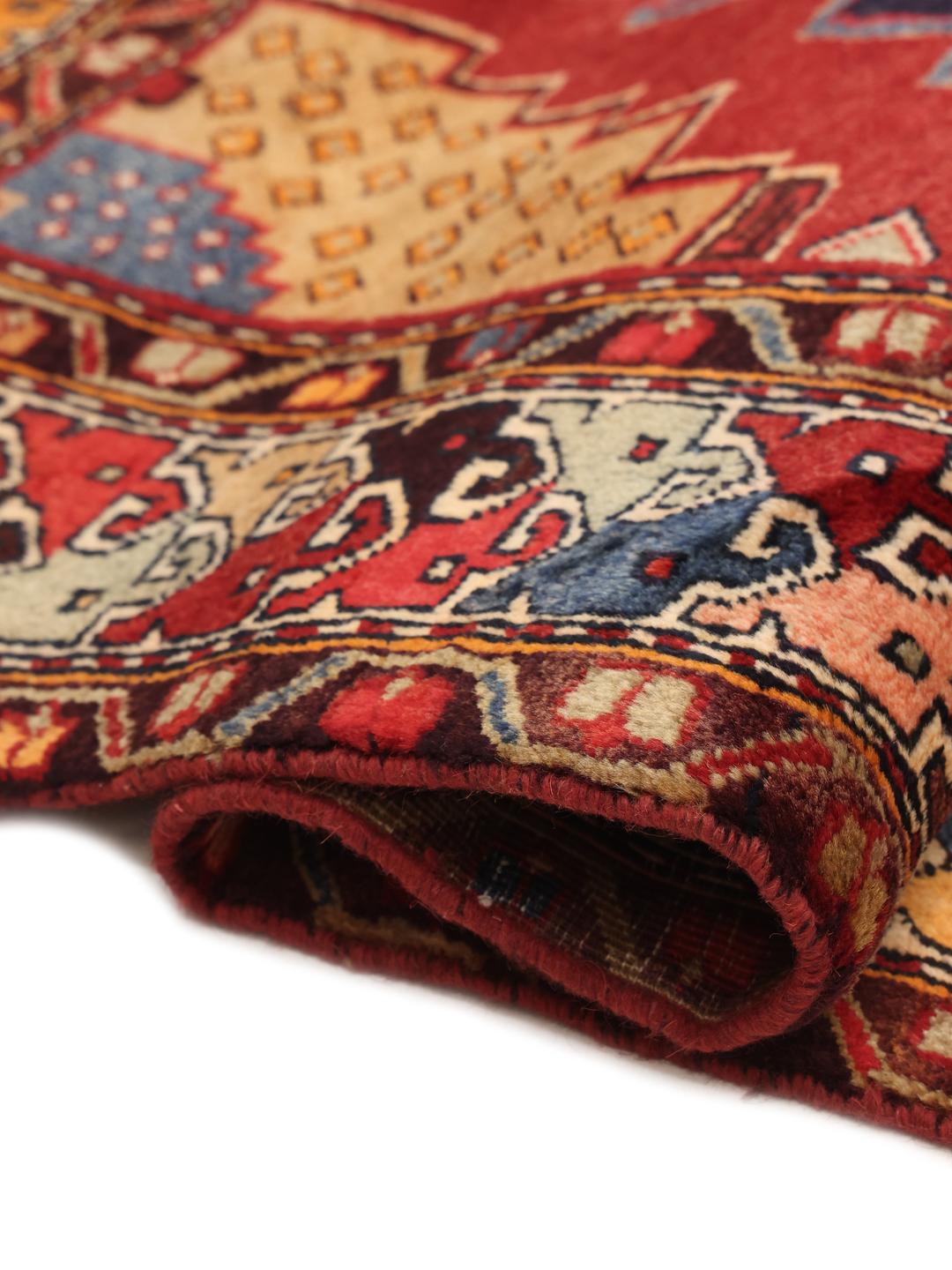 Hand-knotted red and blue Middle Eastern runner rug