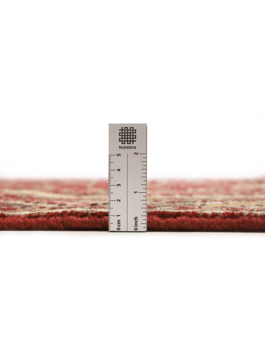 Hand-knotted Hosseinabad rug from the Middle East in shades of red and beige
