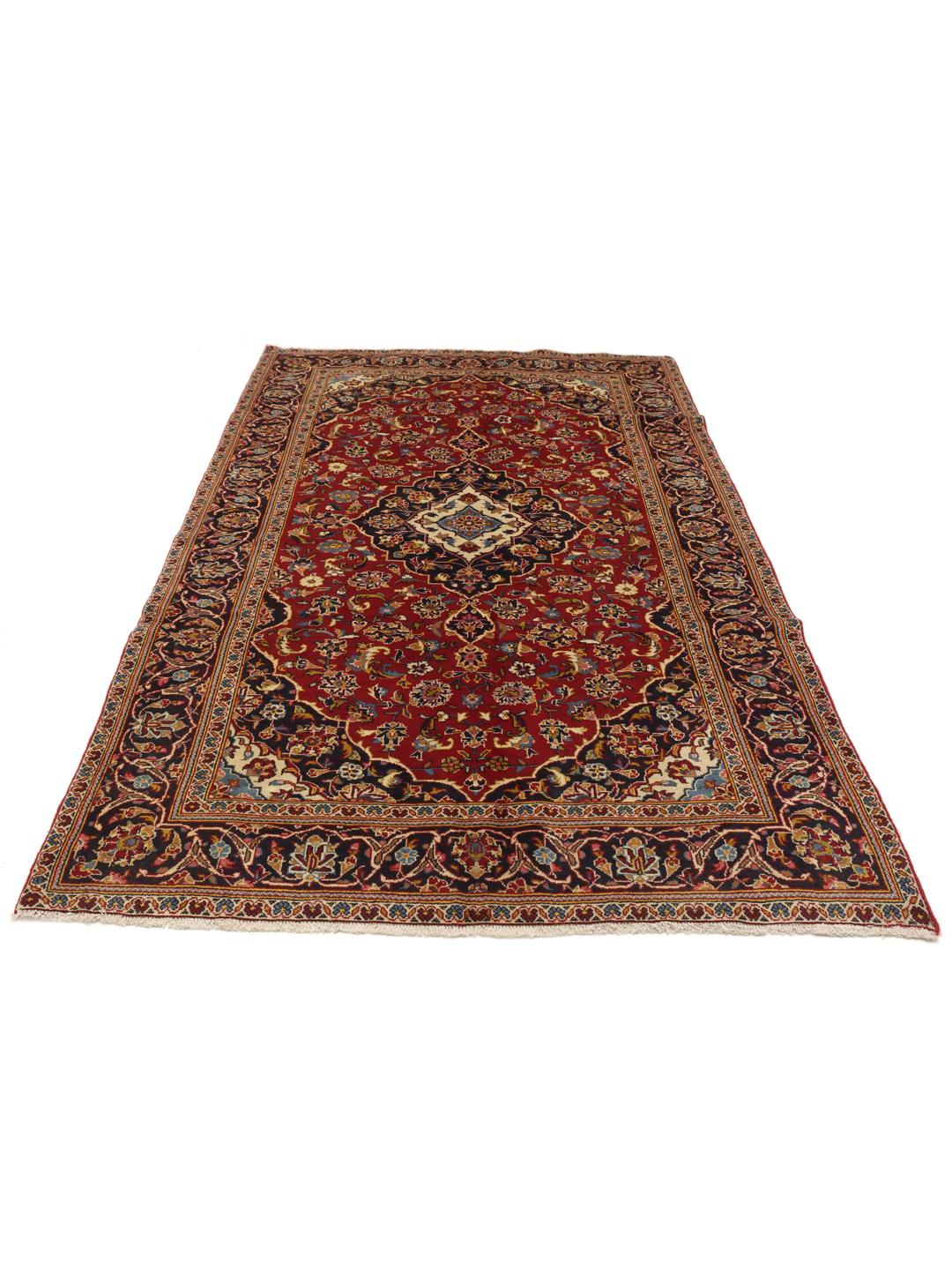 Hand-knotted Keshan rug from the Middle East in red and blue
