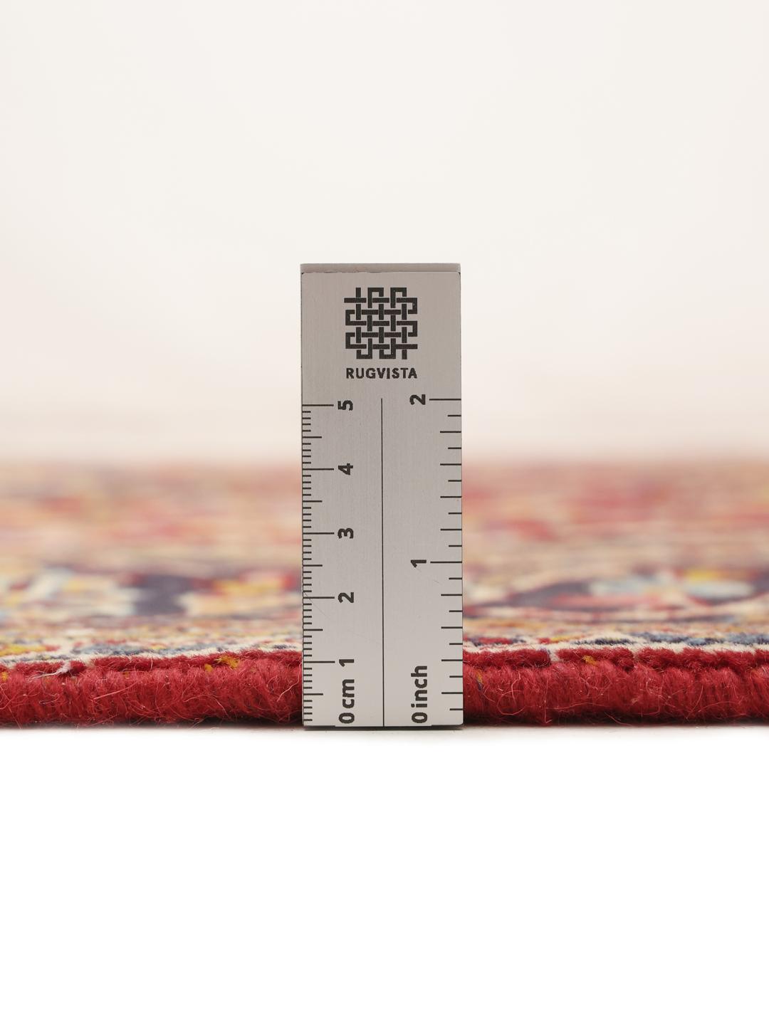 Hand-knotted Keshan rug from the Middle East in red and blue