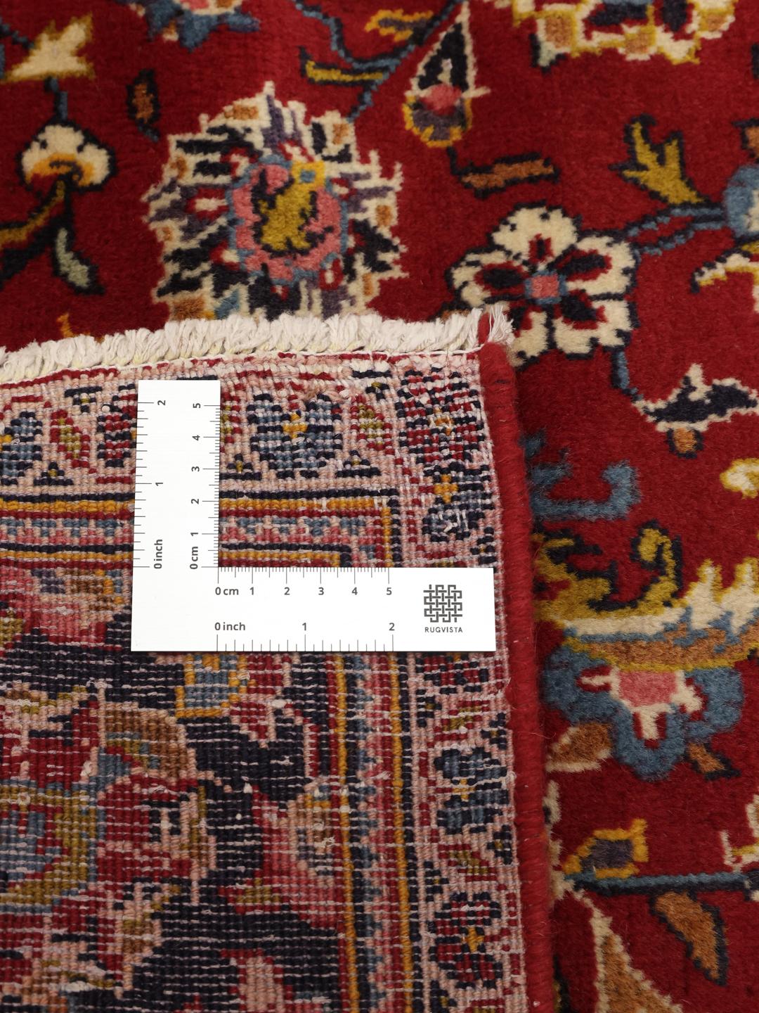 Hand-knotted Keshan rug from the Middle East in red and blue