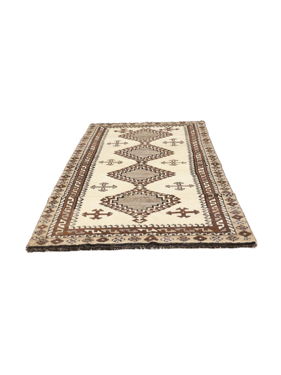 A hand-knotted Shiraz rug from the Middle East featuring geometric patterns in brown and beige.