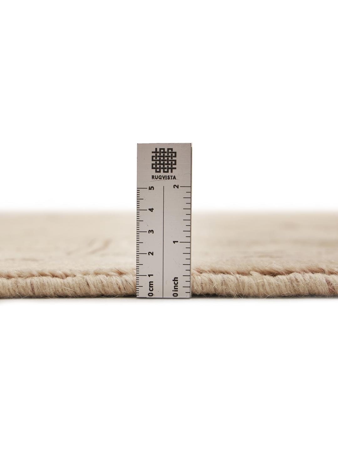 Et håndknyttet beige Heriz-tæppe med geometriske mønstre fra Mellemøsten.