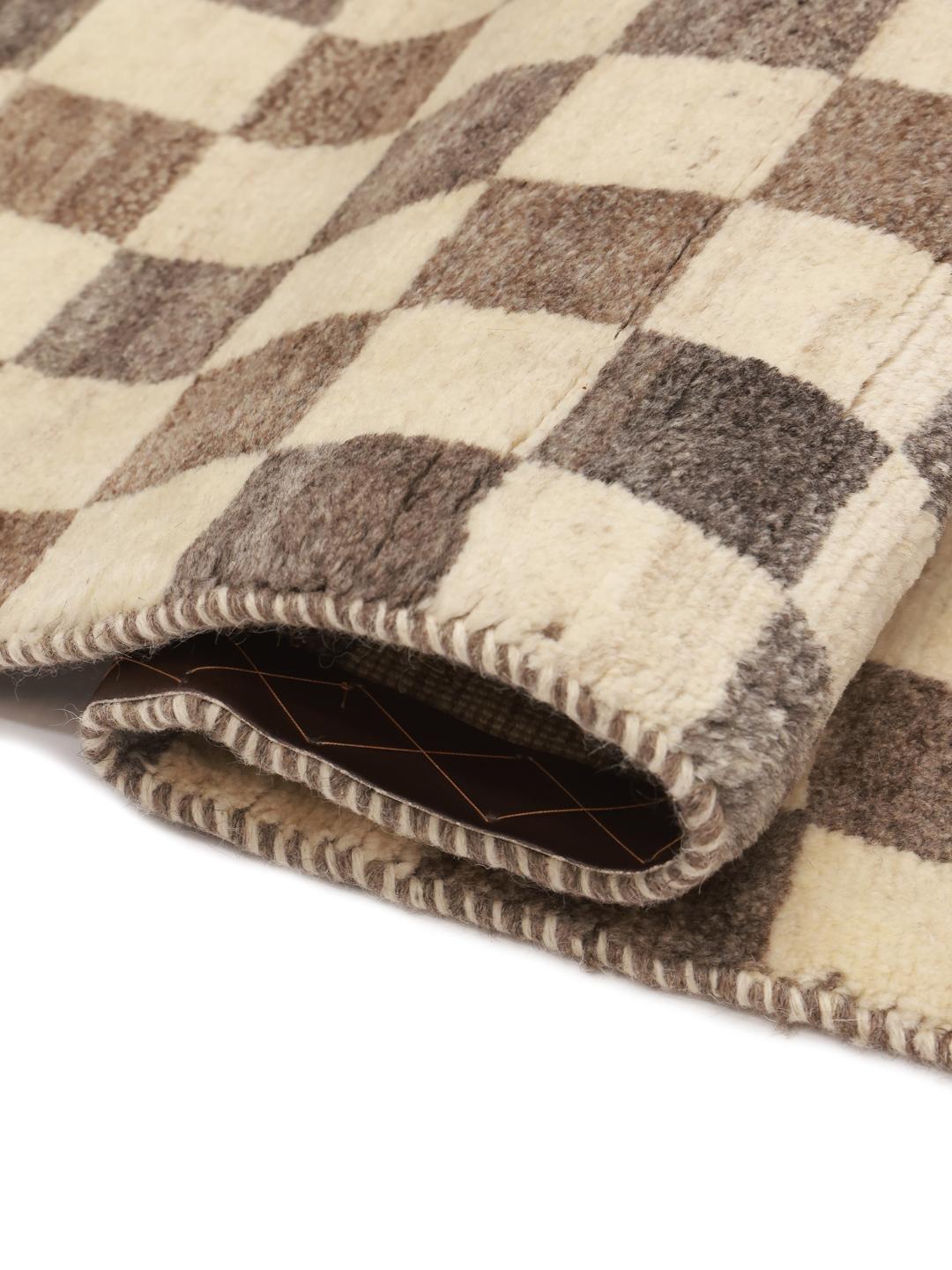 Hand-knotted Shabargan rug with a beige and brown checkerboard pattern
