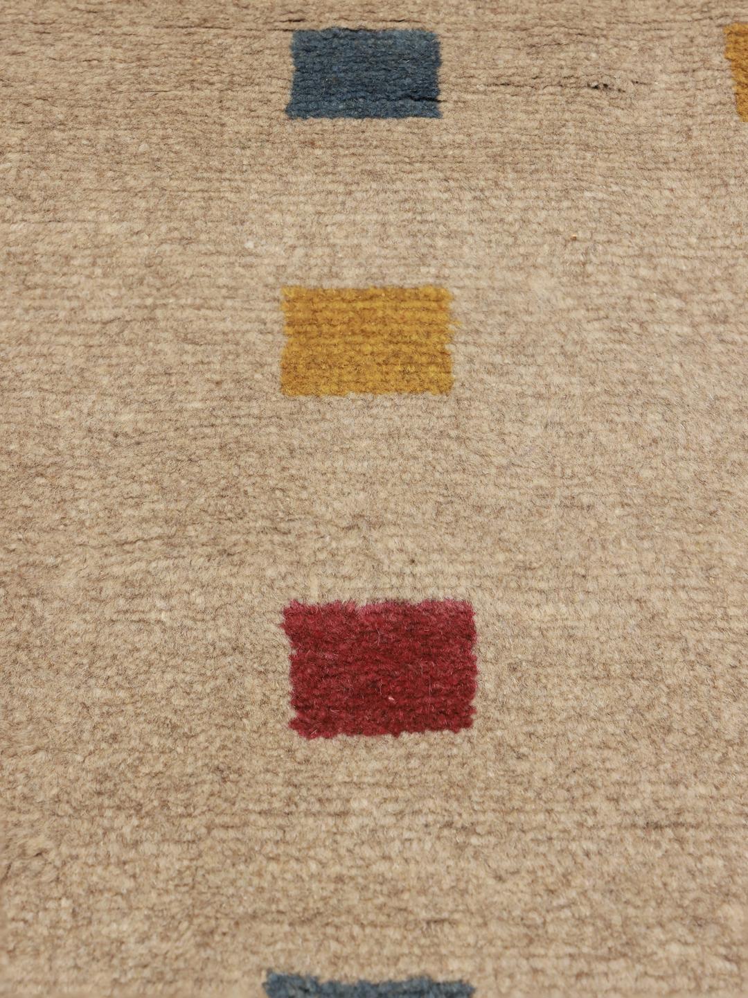 Hand-knotted Gabbeh rug from the Middle East in beige with colourful geometric accents
