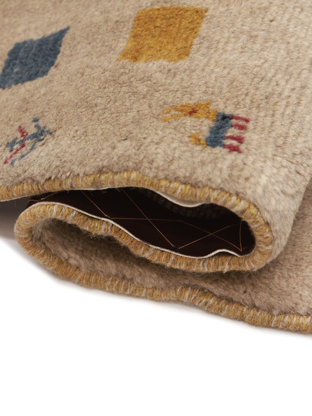 Hand-knotted Gabbeh rug from the Middle East in beige with colourful geometric accents