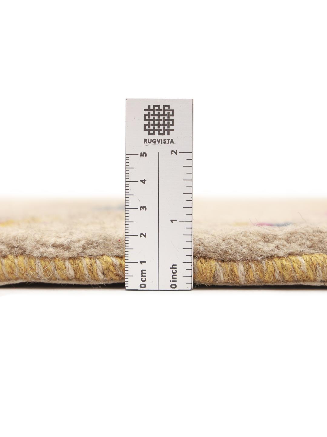 Hand-knotted Gabbeh rug from the Middle East in beige with colourful geometric accents