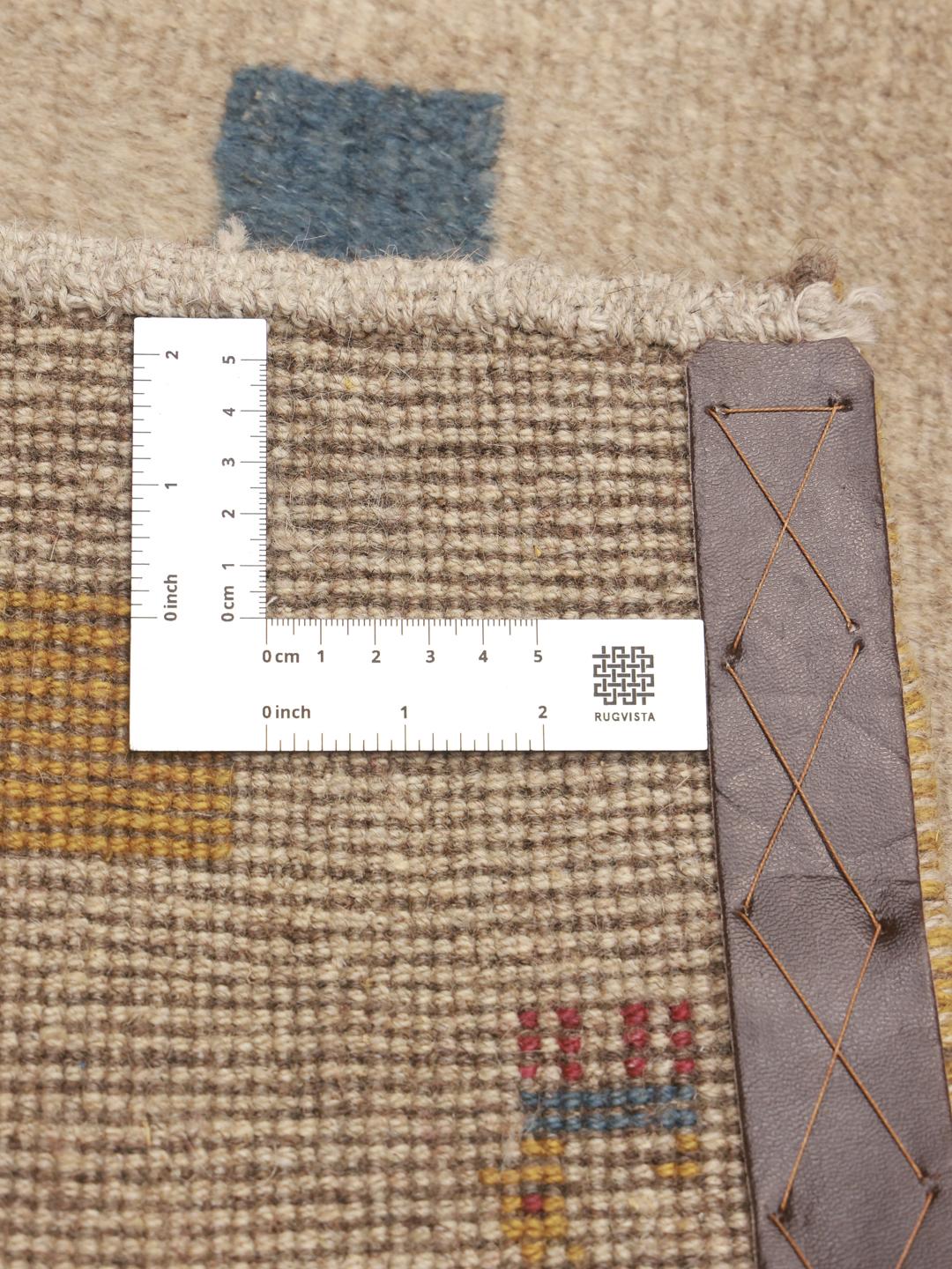 Hand-knotted Gabbeh rug from the Middle East in beige with colourful geometric accents