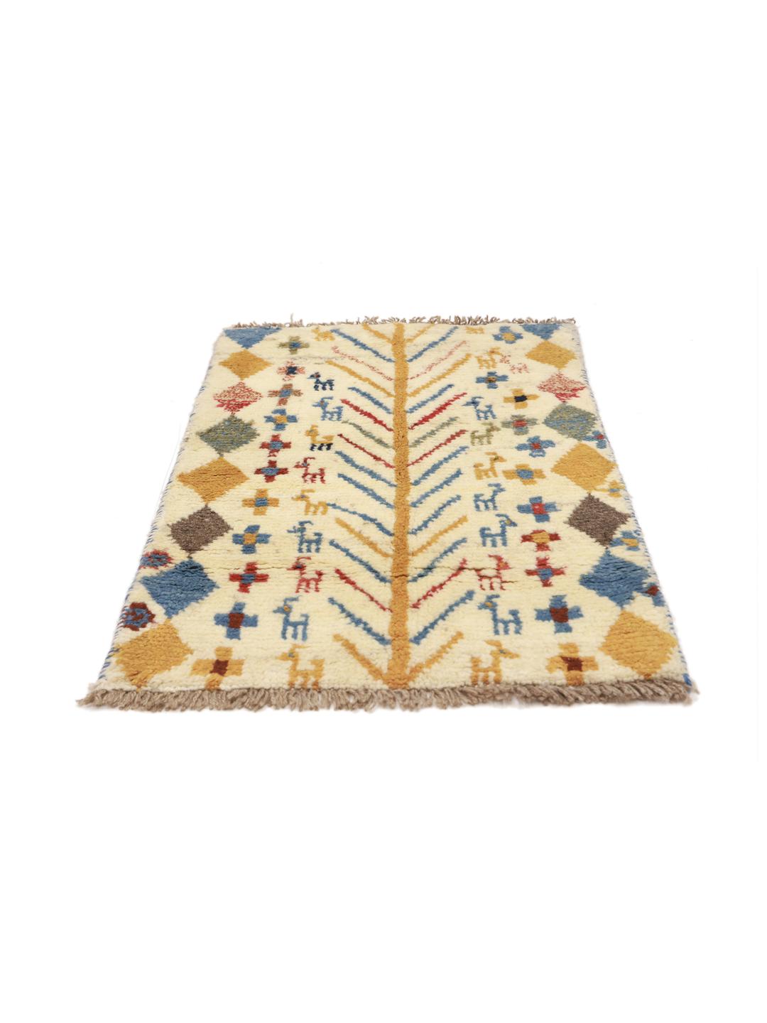 A hand-knotted multicoloured wool Gabbeh rug from the Middle East with whimsical motifs.