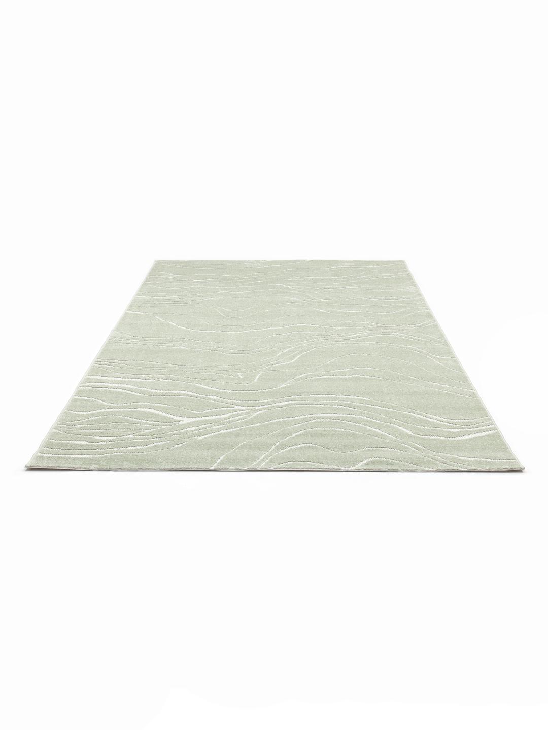 Tapis vert avec motif de vagues organiques