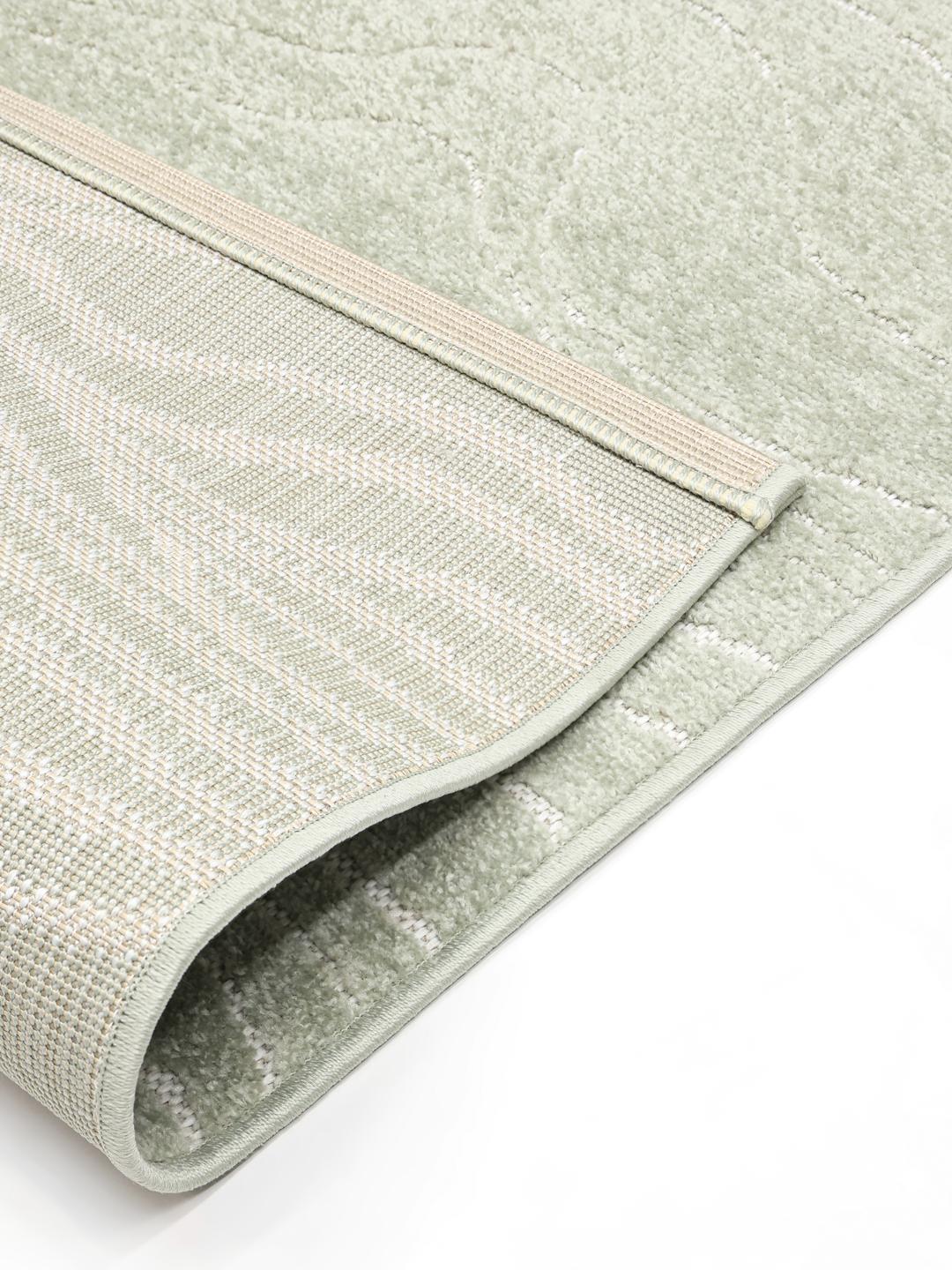 Tapis vert avec motif de vagues organiques