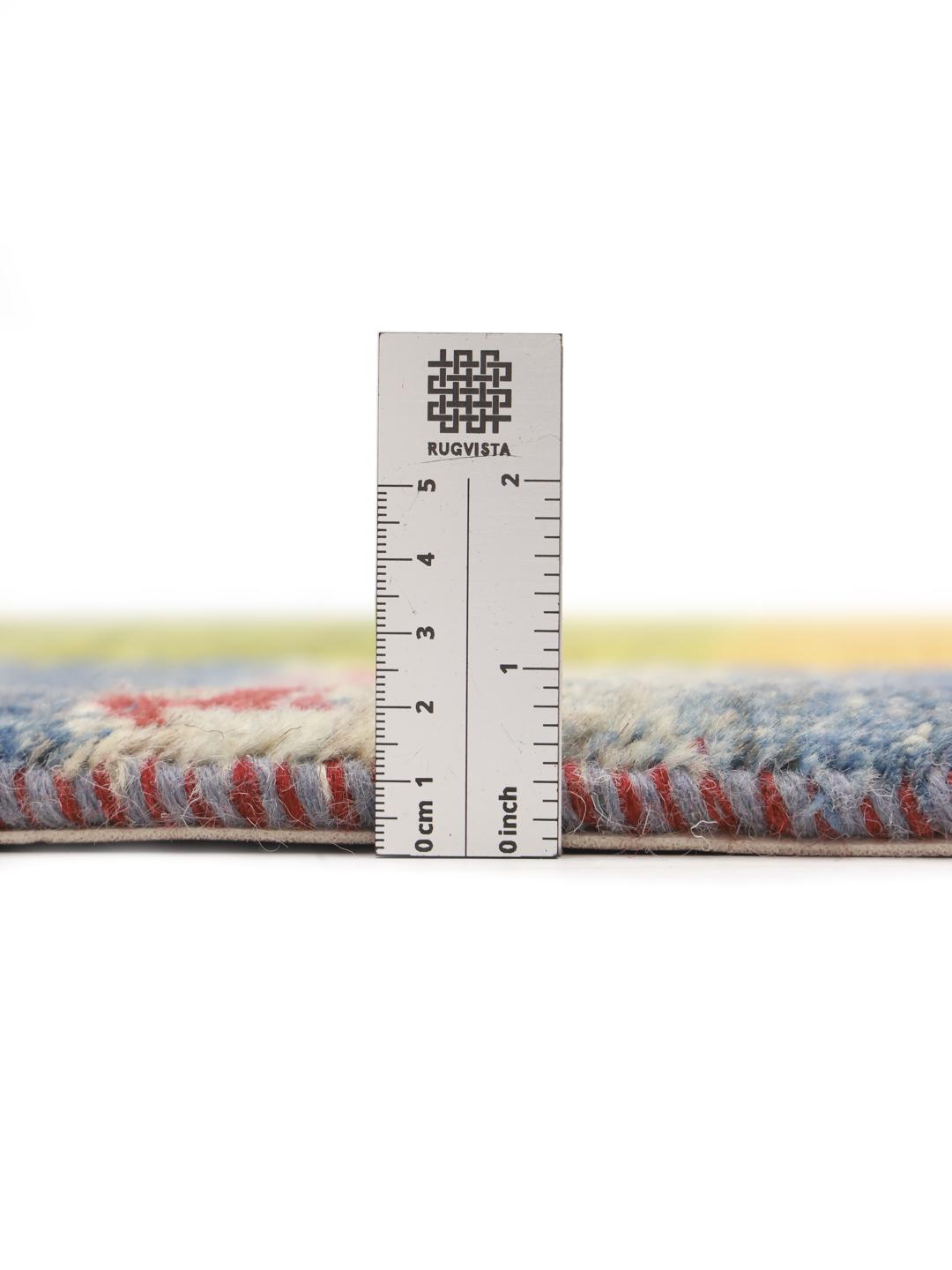 Hand-knotted Gabbeh rug from the Middle East in blue with organic central motif