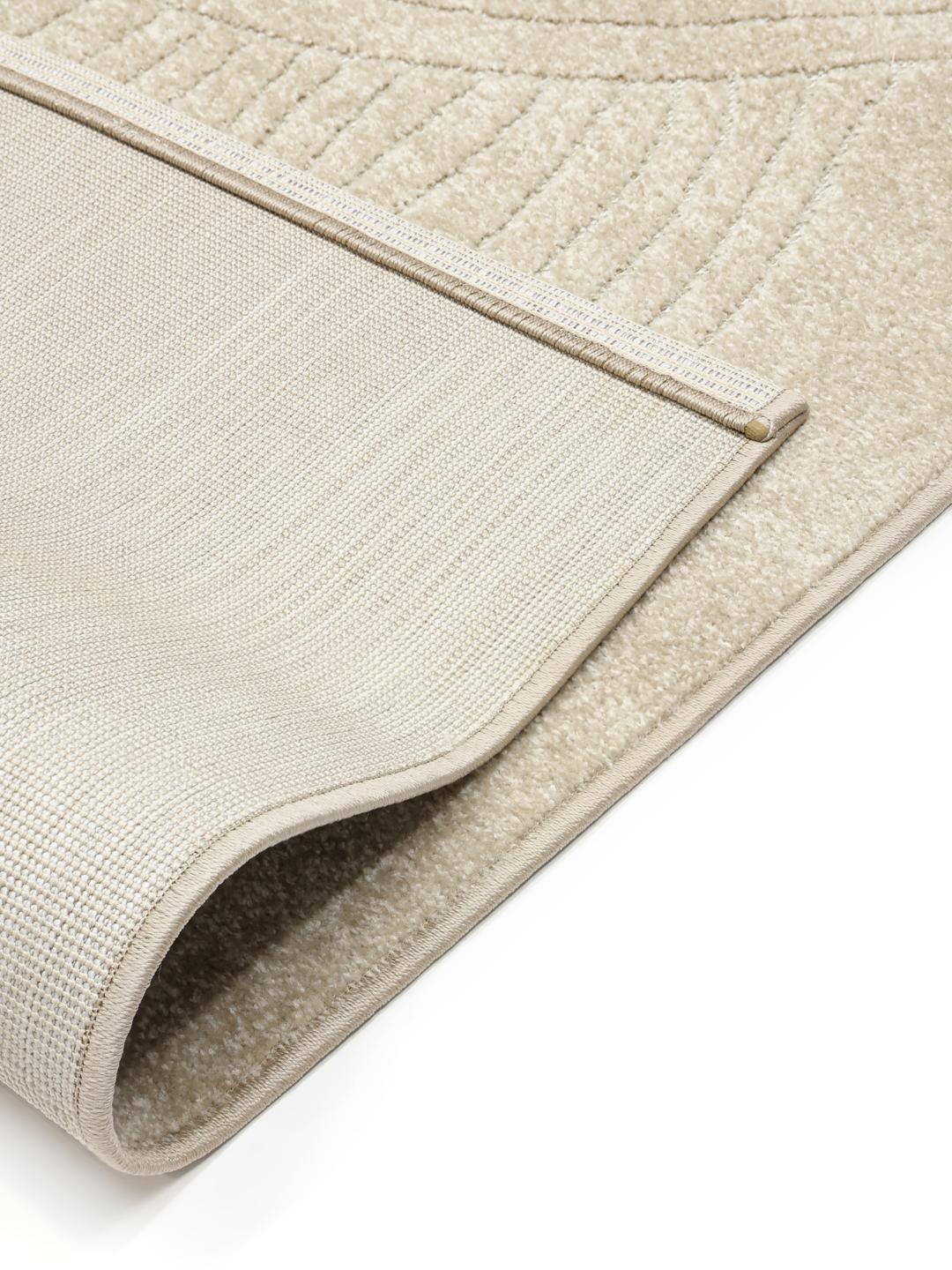 Beige tæppe med organiske linjer