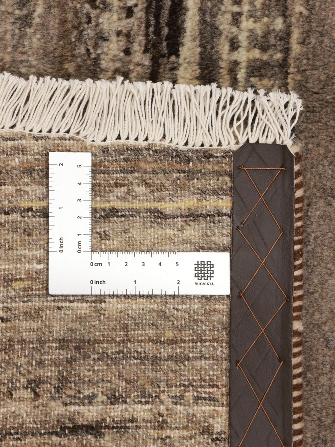 Hand-knotted Gabbeh rug from the Middle East in earthy brown tones