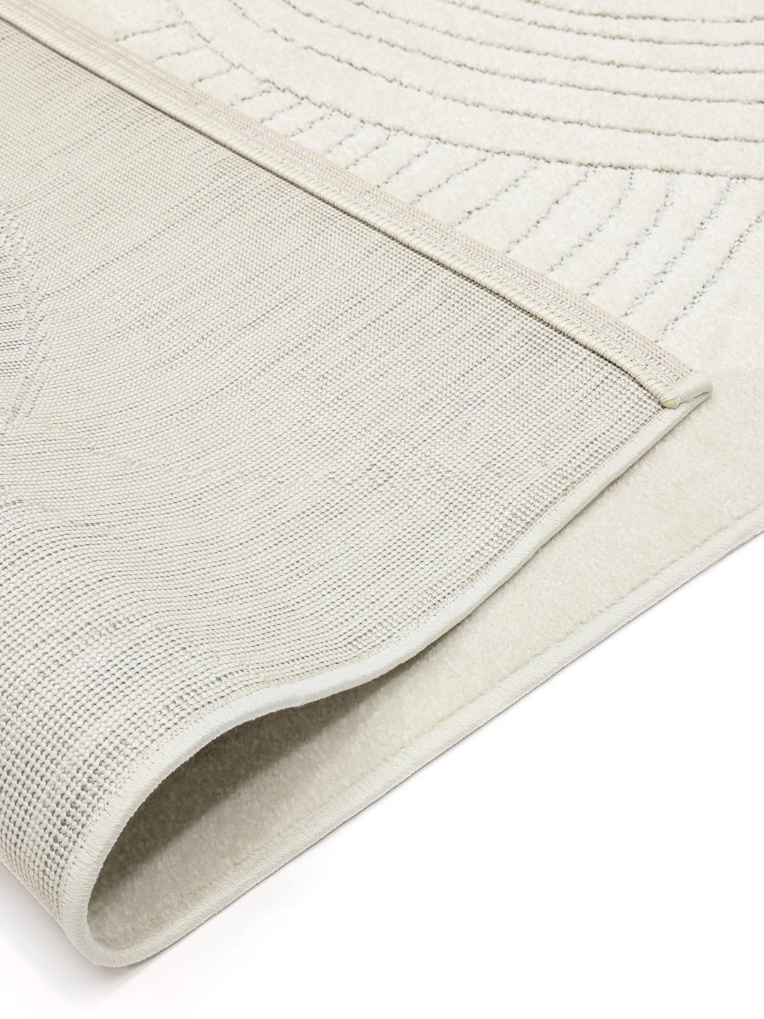 Tappeto bianco con linee curve organiche