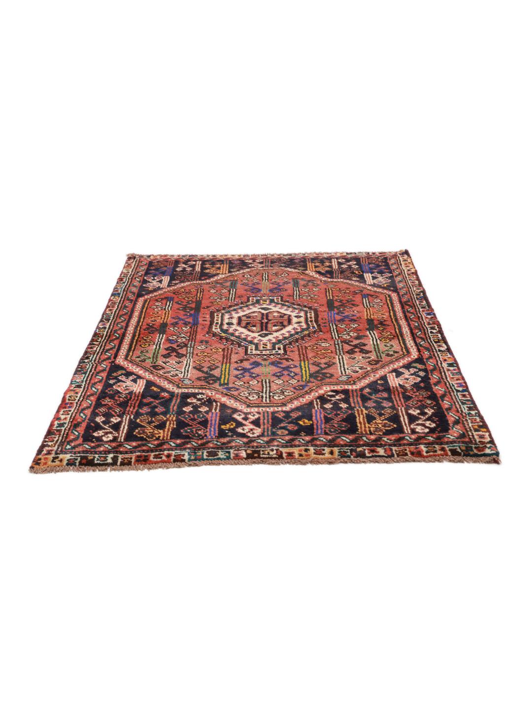 Hand-knotted Shiraz rug from the Middle East in dark-red and blue tones