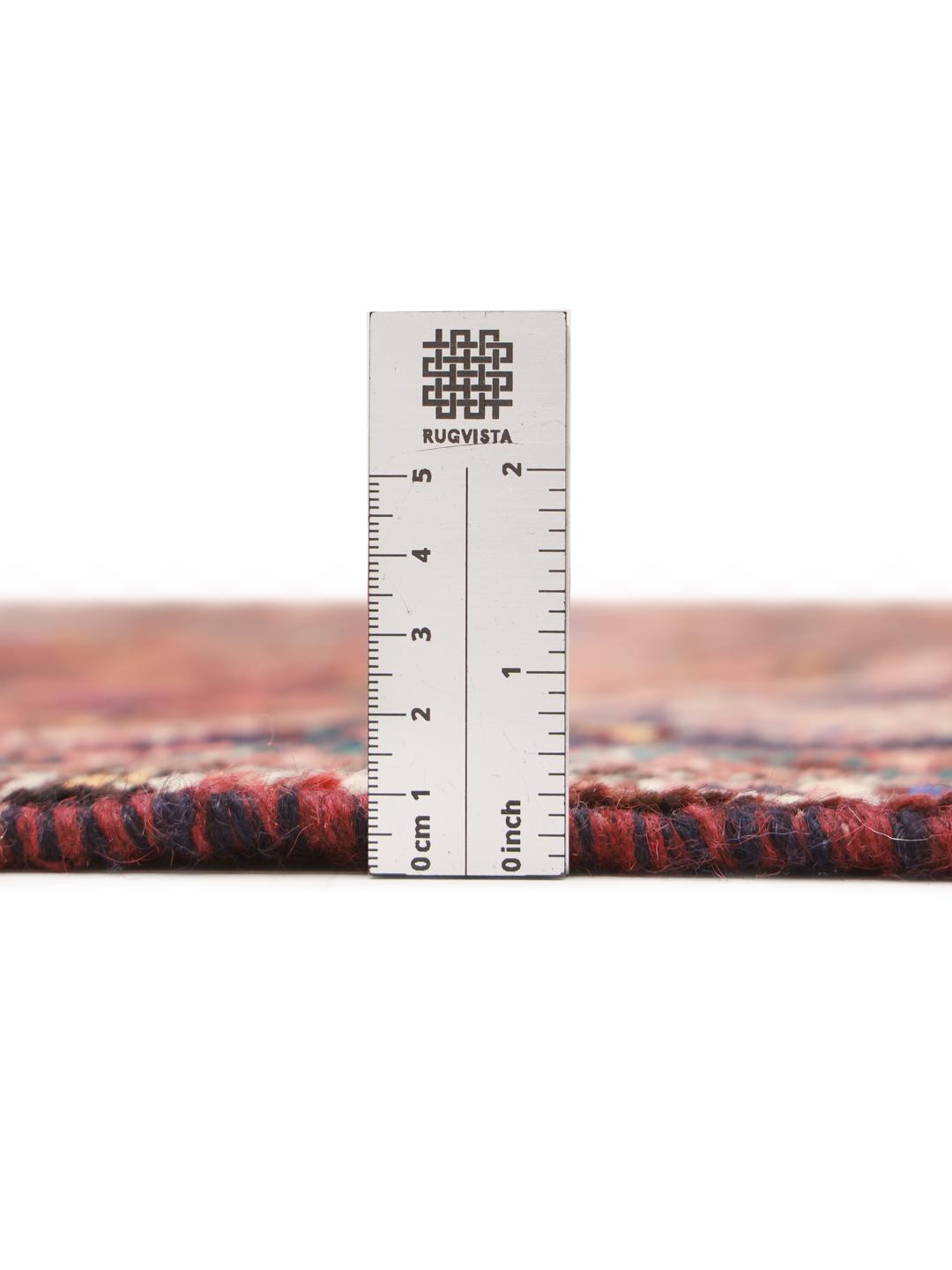 Hand-knotted Shiraz rug from the Middle East in dark-red and blue tones