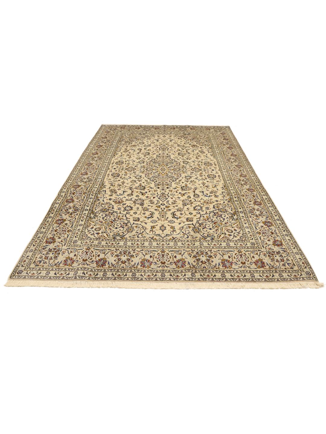 Hand-knotted Keshan rug from the Middle East in a beige colour palette.