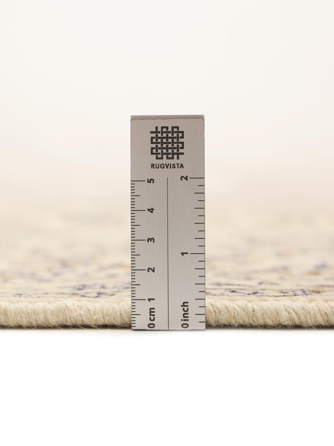 Hand-knotted Keshan rug from the Middle East in a beige colour palette.