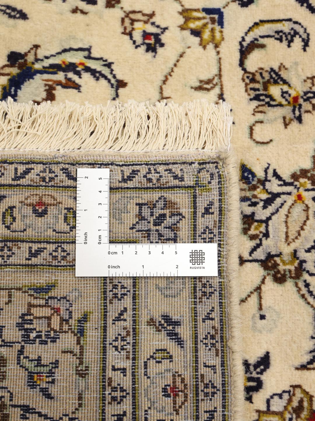Hand-knotted Keshan rug from the Middle East in a beige colour palette.