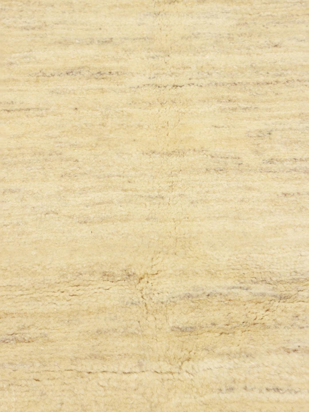 Hand-knotted wool Gabbeh rug from the Middle East in beige tones
