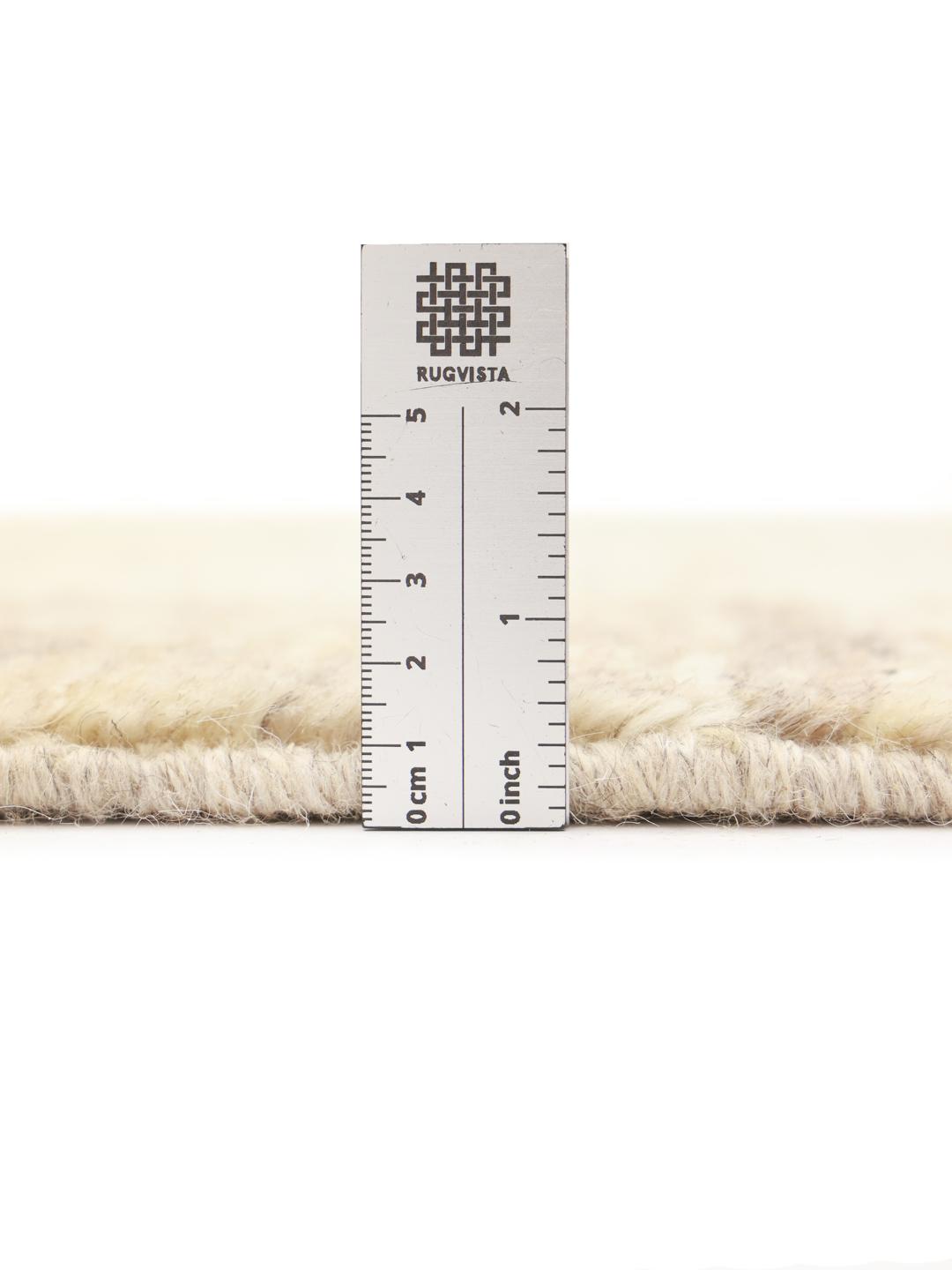 Hand-knotted wool Gabbeh rug from the Middle East in beige tones