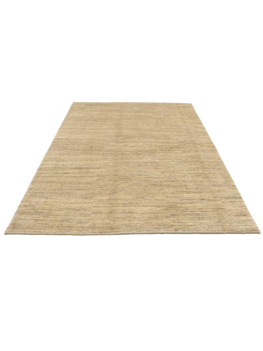 Hand-knotted beige Shabargan rug from the Middle East