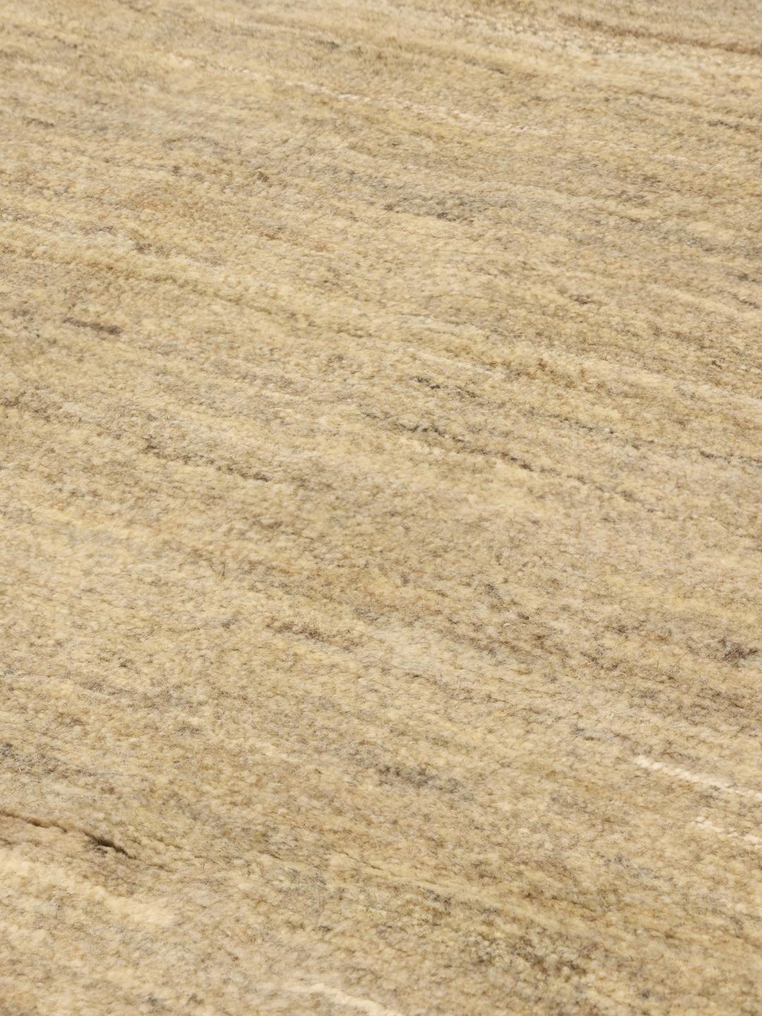 Hand-knotted beige Shabargan rug from the Middle East