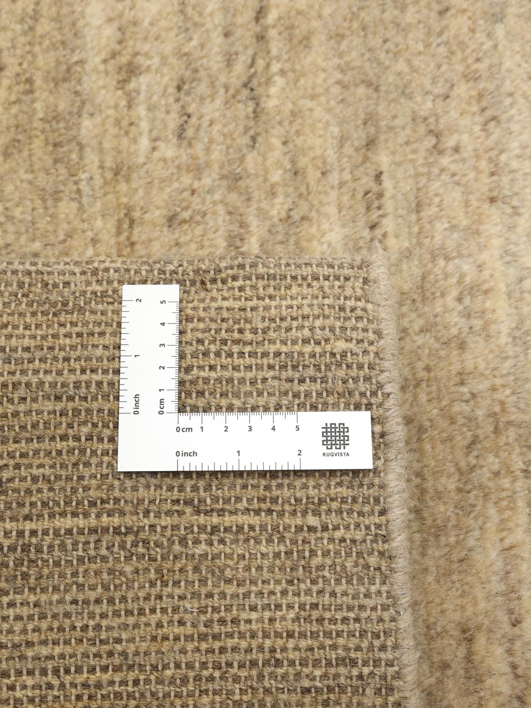 Hand-knotted beige Shabargan rug from the Middle East