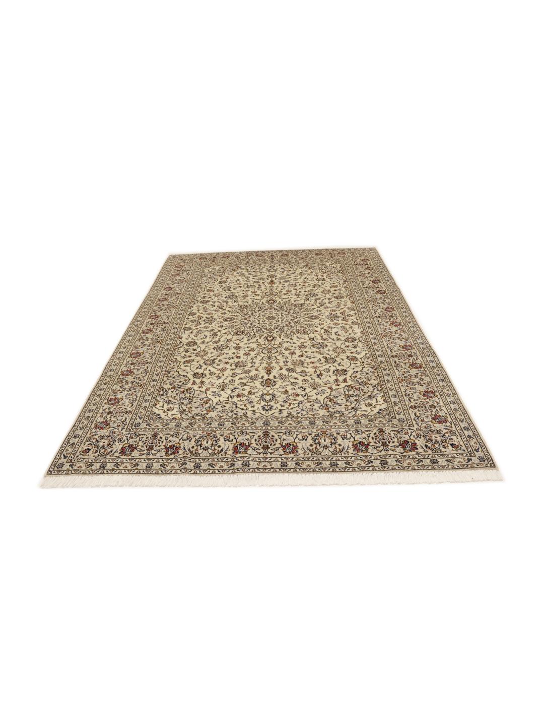 Hand-knotted Keshan rug from the Middle East with a beige field and intricate floral pattern