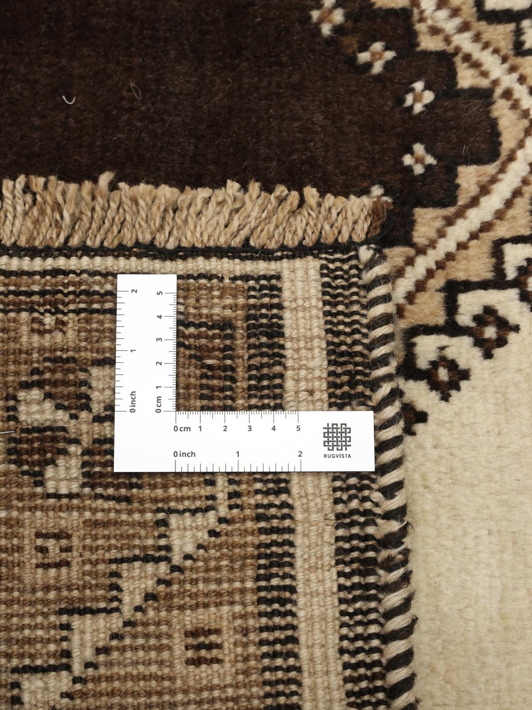 Hand-knotted Shiraz rug with geometric diamond motifs in beige and brown tones