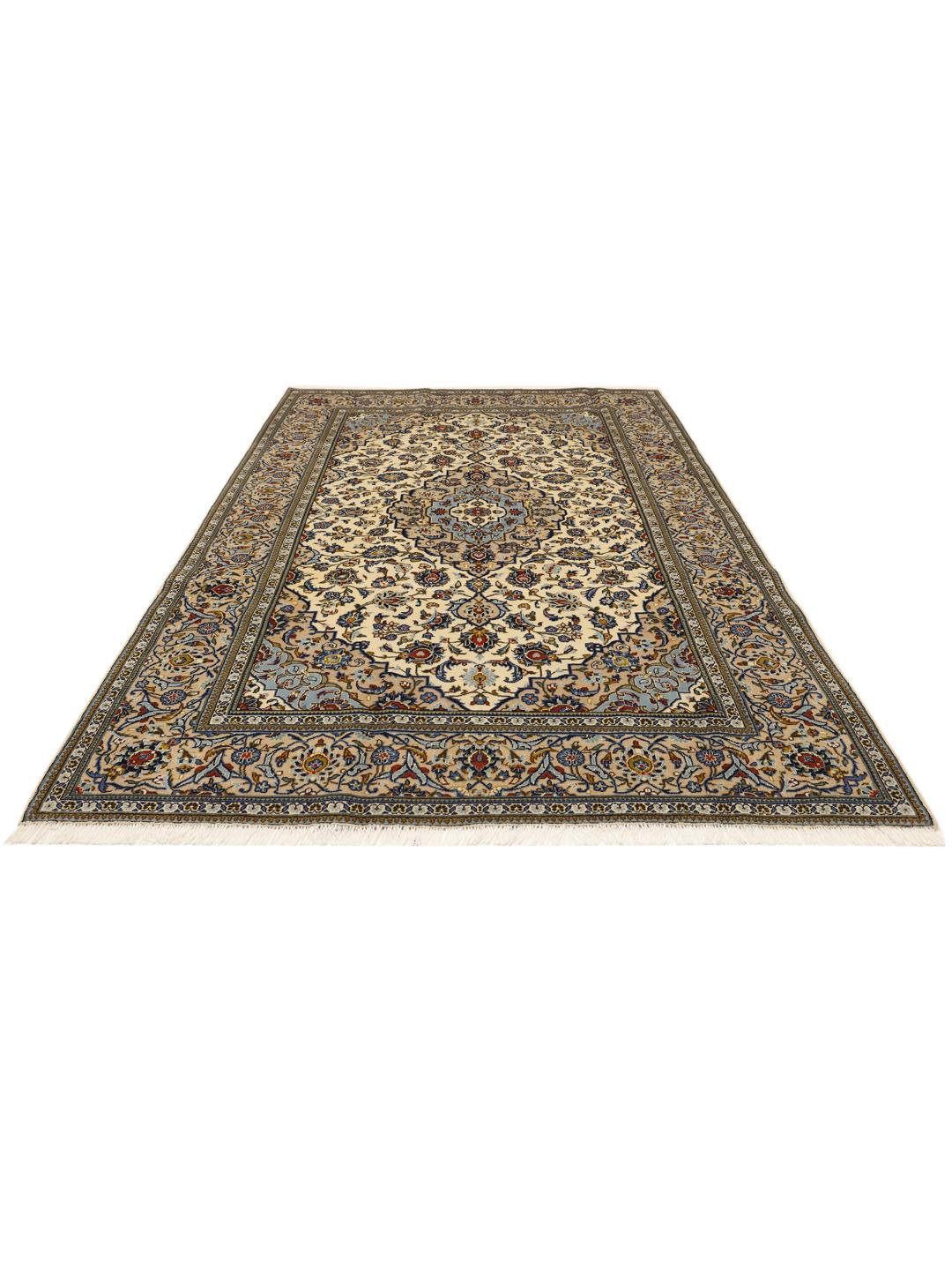 Hand-knotted Keshan rug from the Middle East with a floral medallion in beige and blue.