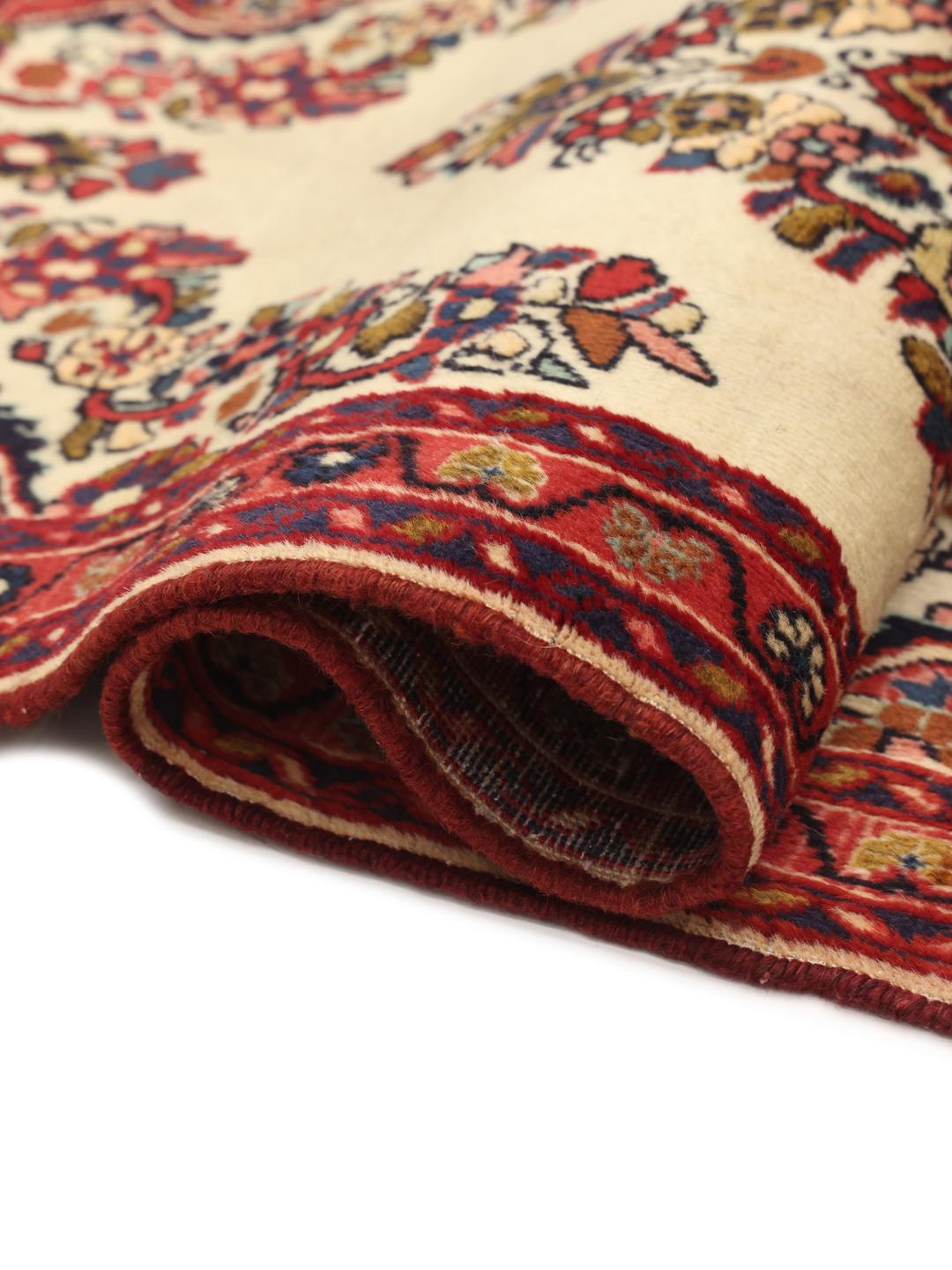 Handgeknoopt Lillian-tapijt met bloemenmedaillon in rode en beige tinten