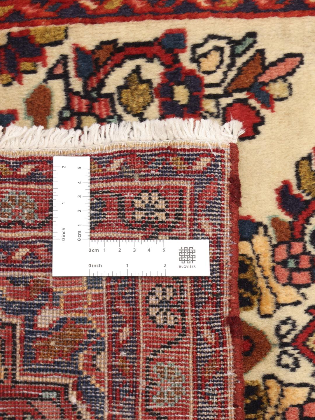 Handgeknoopt Lillian-tapijt met bloemenmedaillon in rode en beige tinten