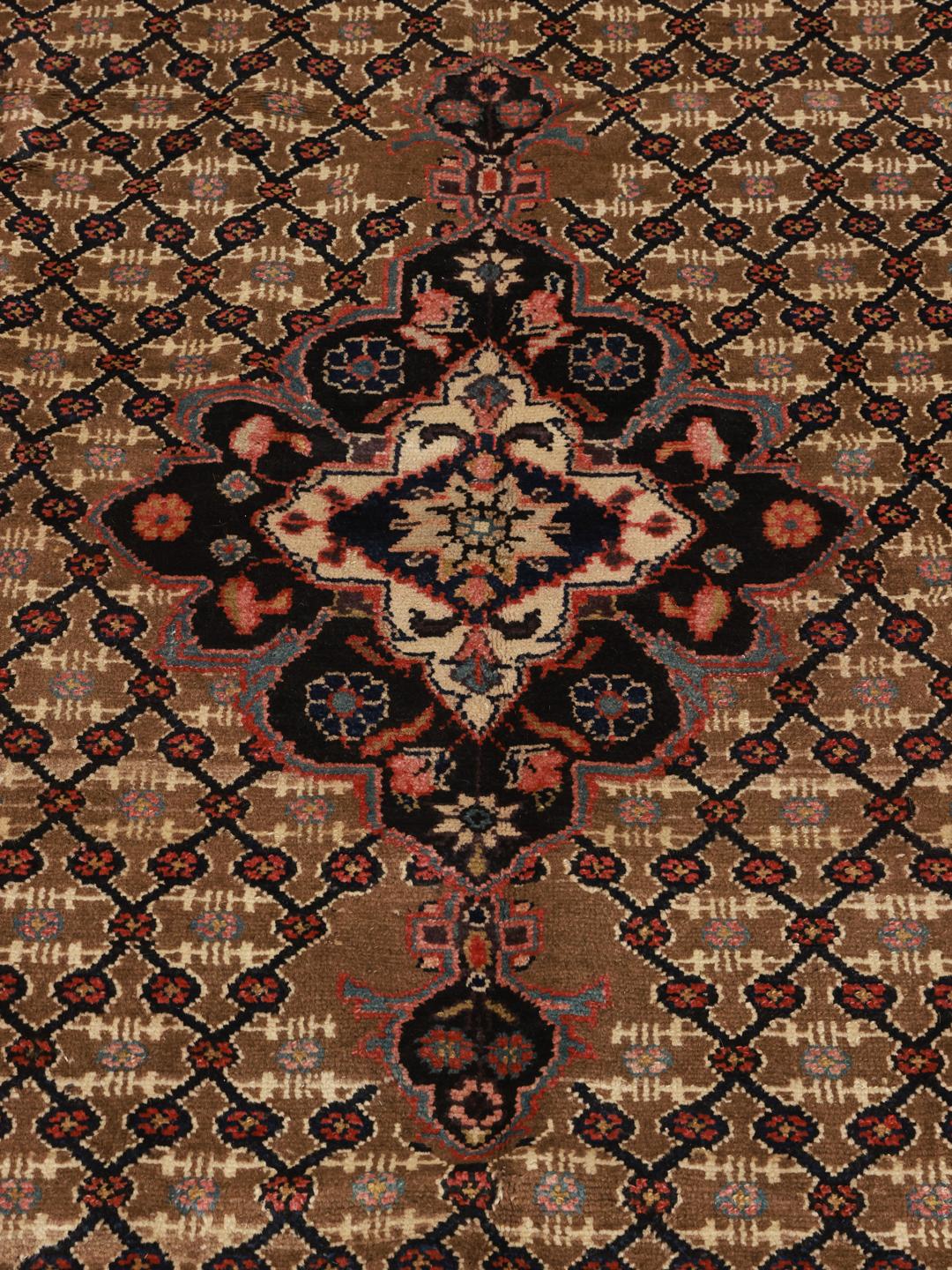 A rectangular handmade Koliai rug from the Middle East in multicolor wool.