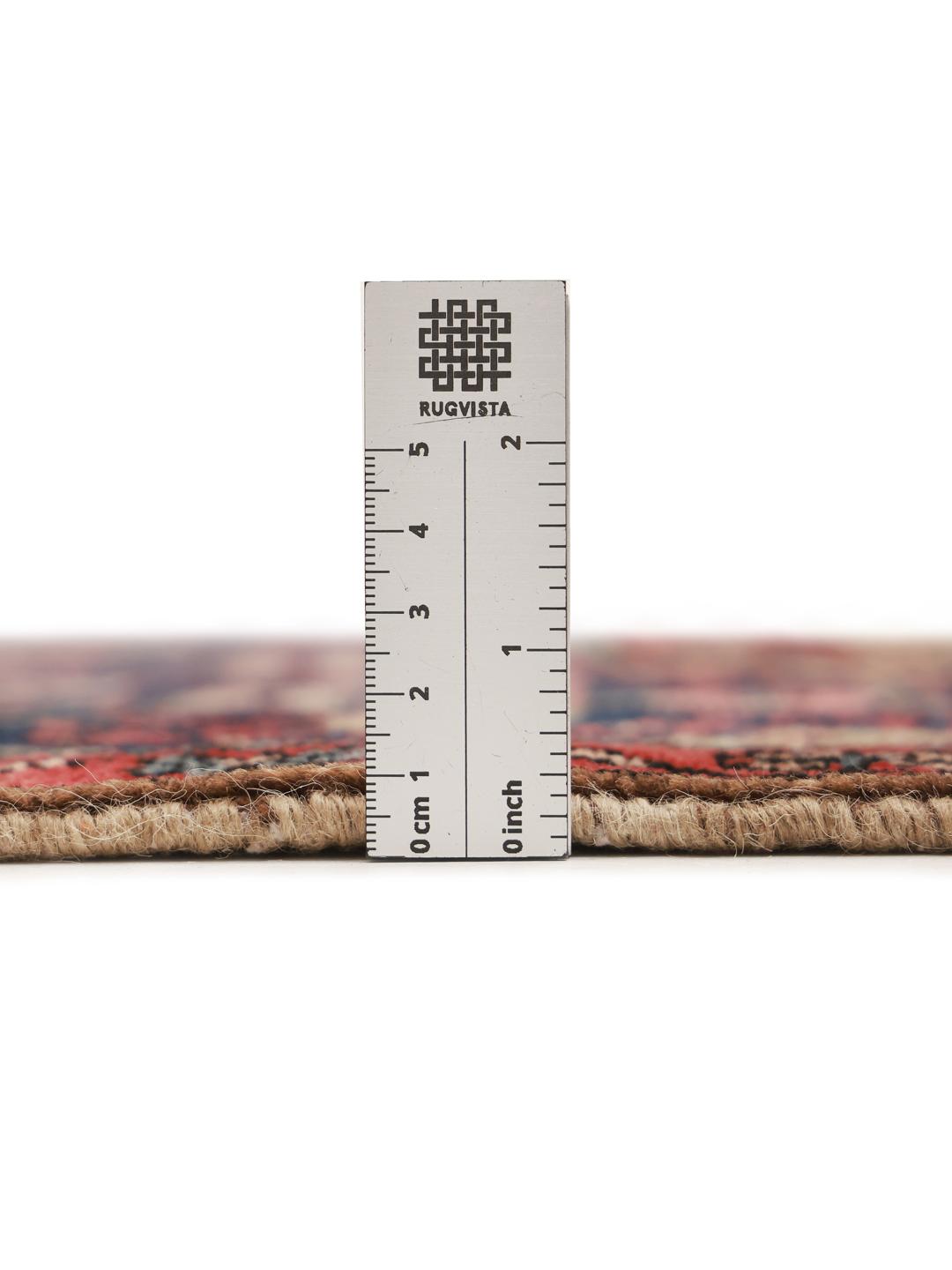 A rectangular handmade Koliai rug from the Middle East in multicolor wool.