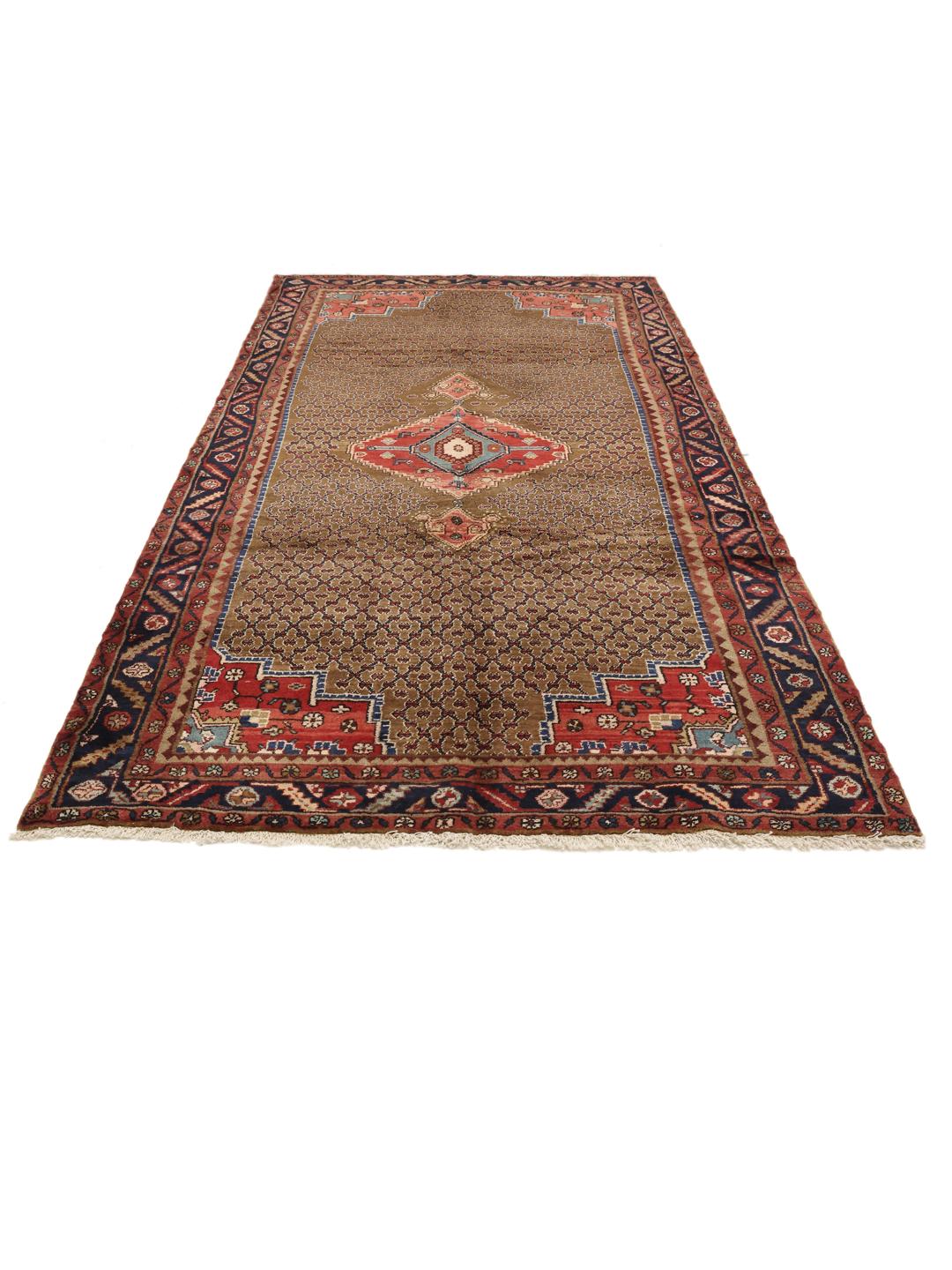 Koliai rug from the Middle East with a brown field and geometric medallion