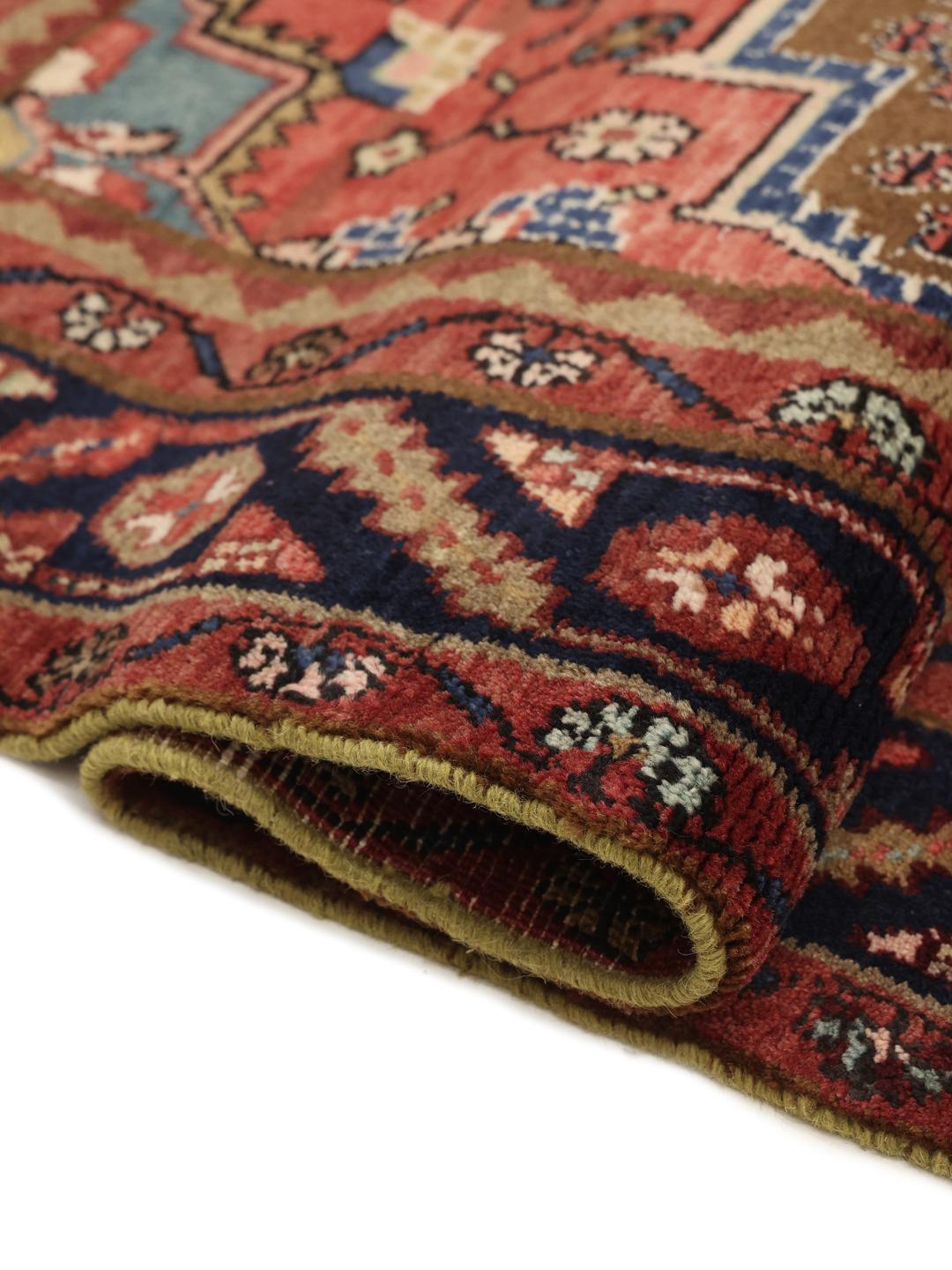 Koliai rug from the Middle East with a brown field and geometric medallion