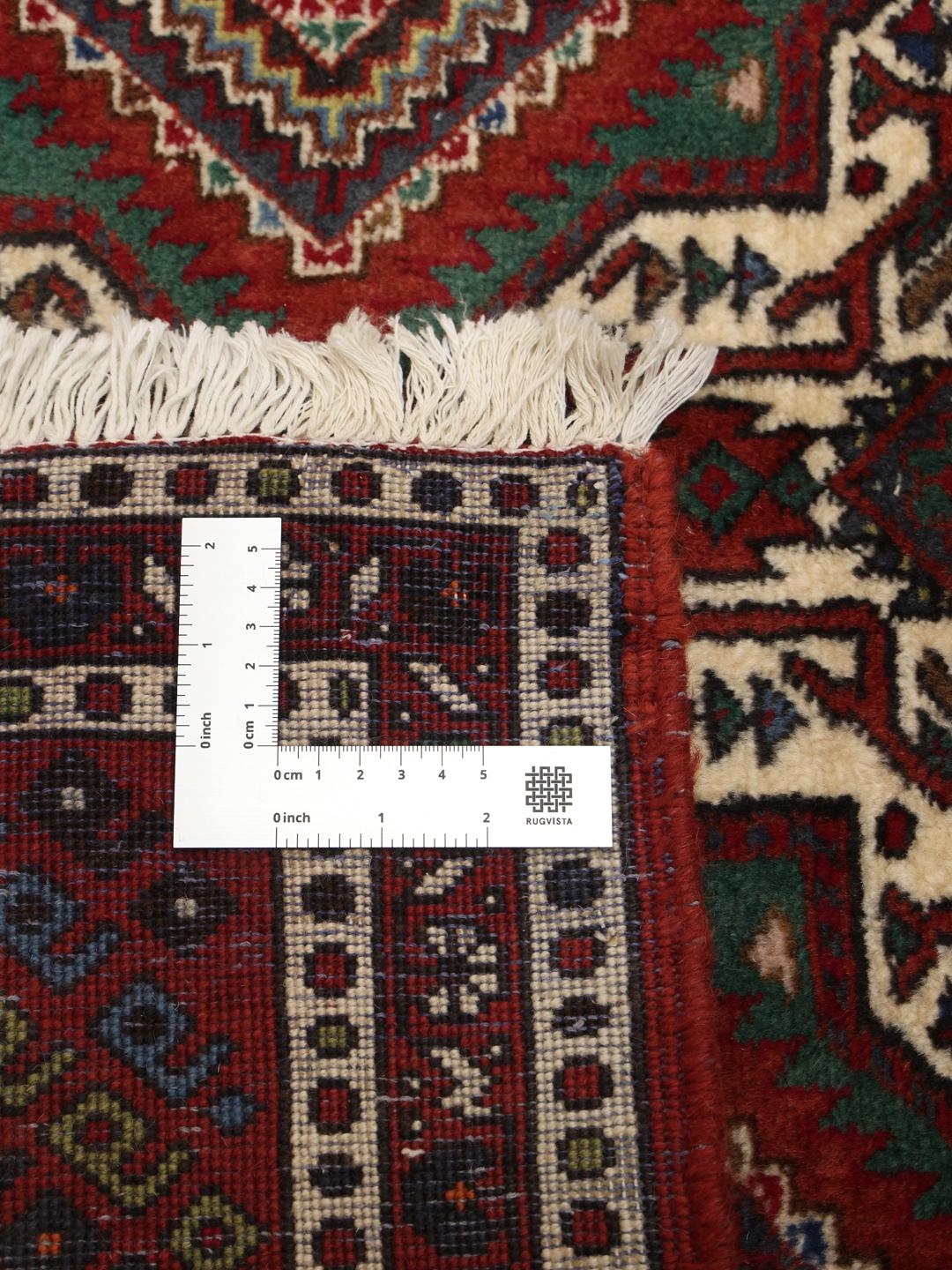 Håndknyttet Afshar Shahre Babak løber med geometriske stammemønstre i røde og mørke toner