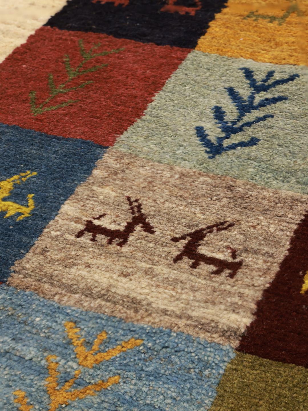 Hand-knotted Gabbeh rug from the Middle East in multicolour