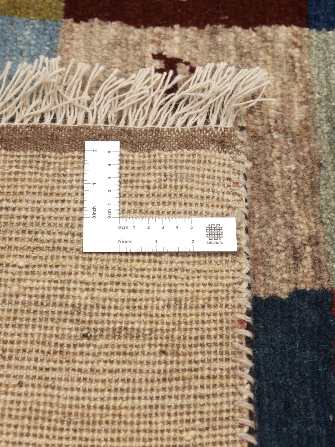 Hand-knotted Gabbeh rug from the Middle East in multicolour