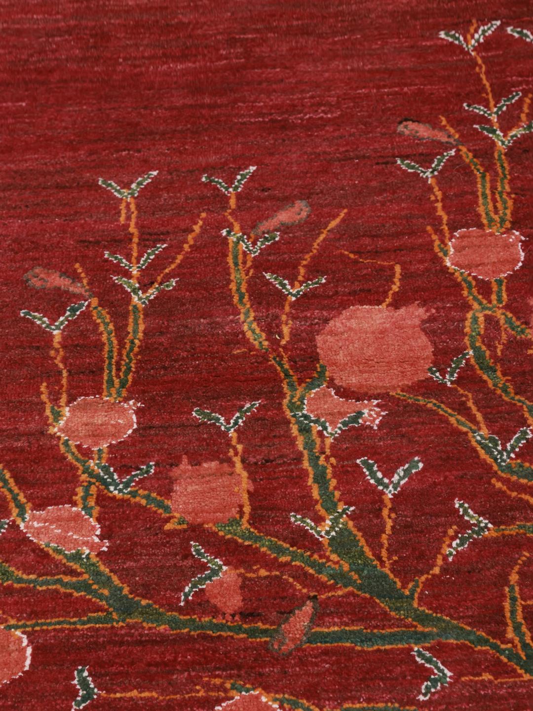 Hand-knotted Gabbeh rug from the Middle East with a red field and a tree of life design