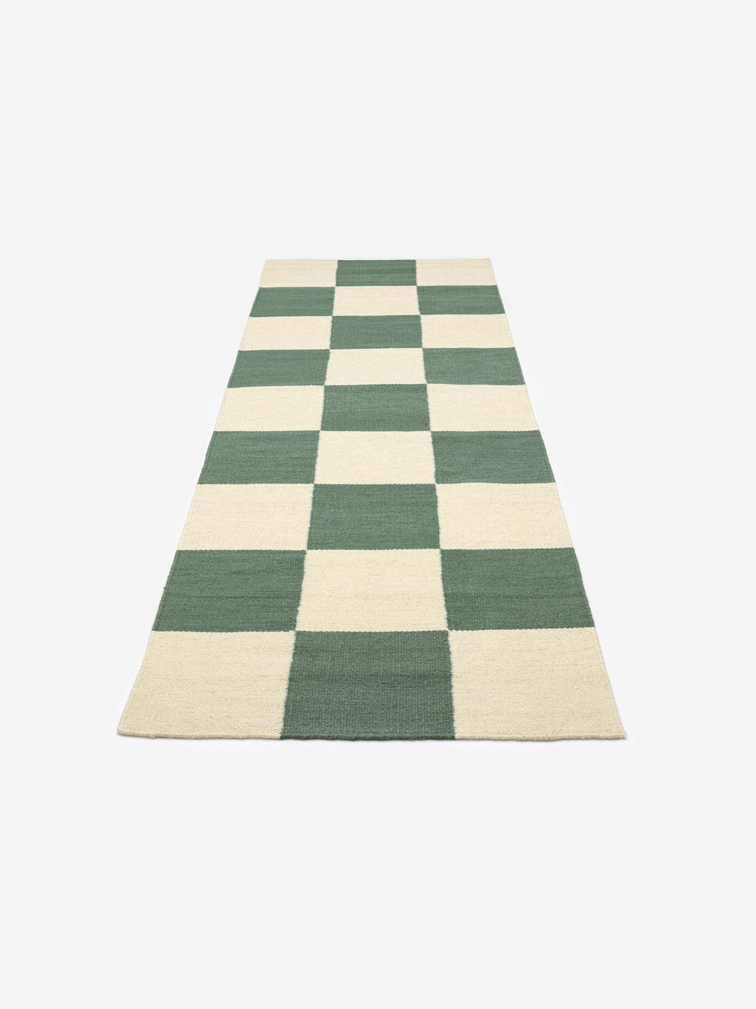 Groene en beige geruite loper