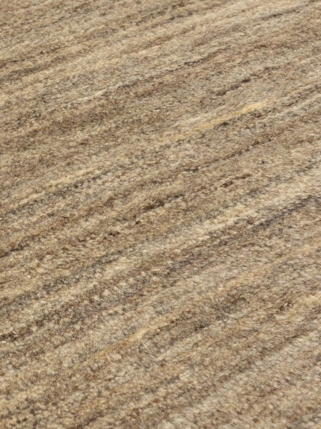 Handmade Gabbeh rug from the Middle East in beige tones