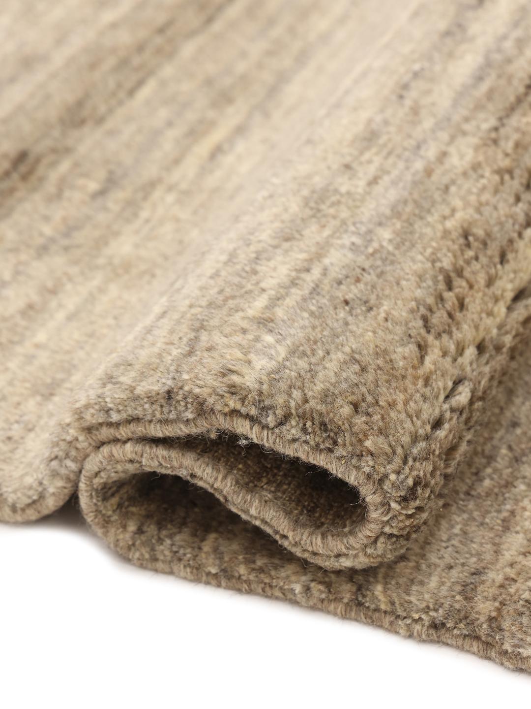 Handmade Gabbeh rug from the Middle East in beige tones