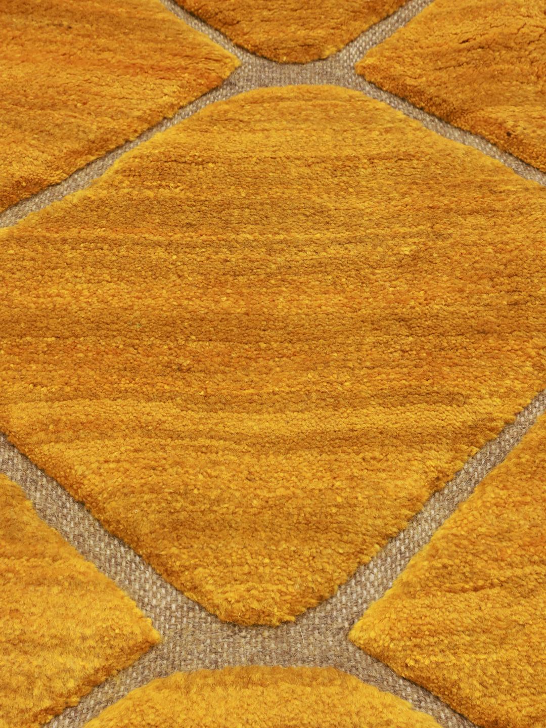 Hand-knotted yellow Berber rug with a geometric diamond pattern