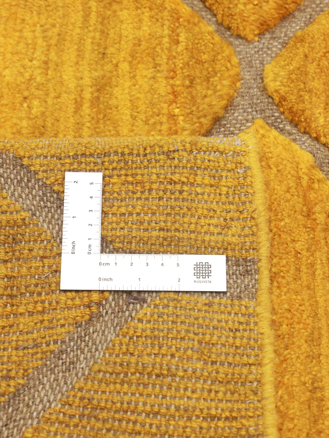 Hand-knotted yellow Berber rug with a geometric diamond pattern