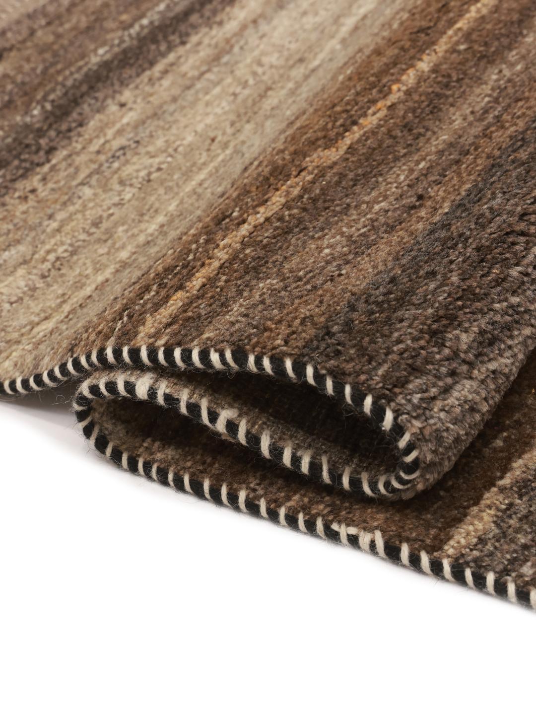 Hand-knotted Gabbeh rug from the Middle East in brown tones
